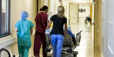 nurses transporting a patient